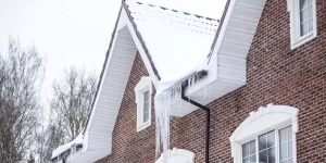 brick house with-icy roof